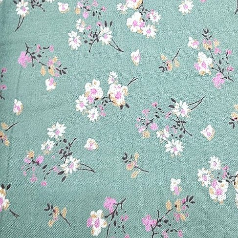 Green Floral Cotton Fabric, laid flat