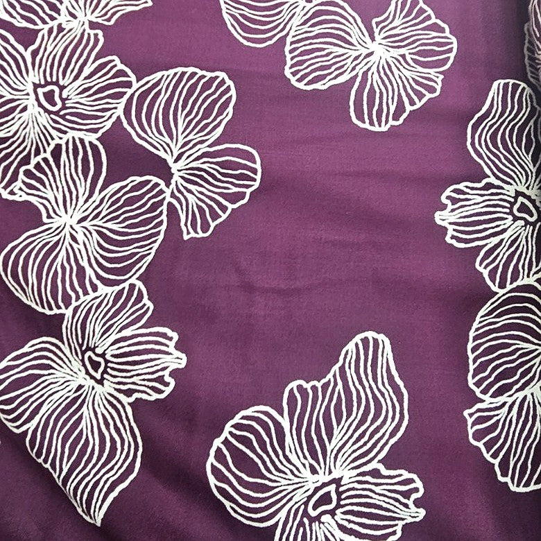 Purple Floral Rayon Fabric, laid flat