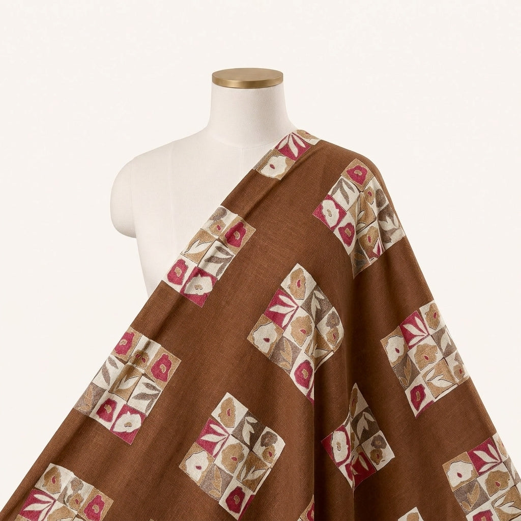 Brown Floral Rayon Fabric Draped as a saree