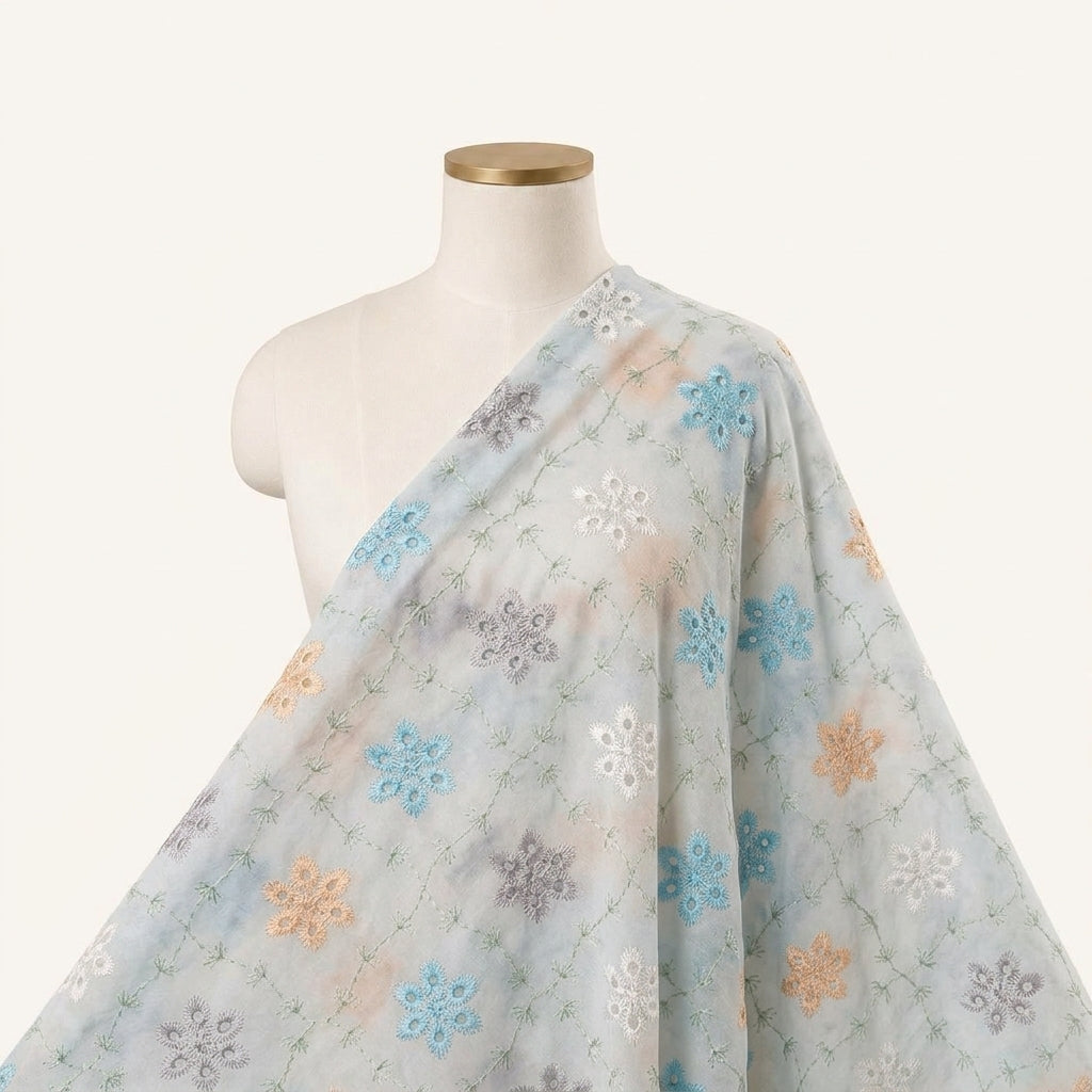 Embroidery White Embroidery Cotton Fabric Draped as a saree