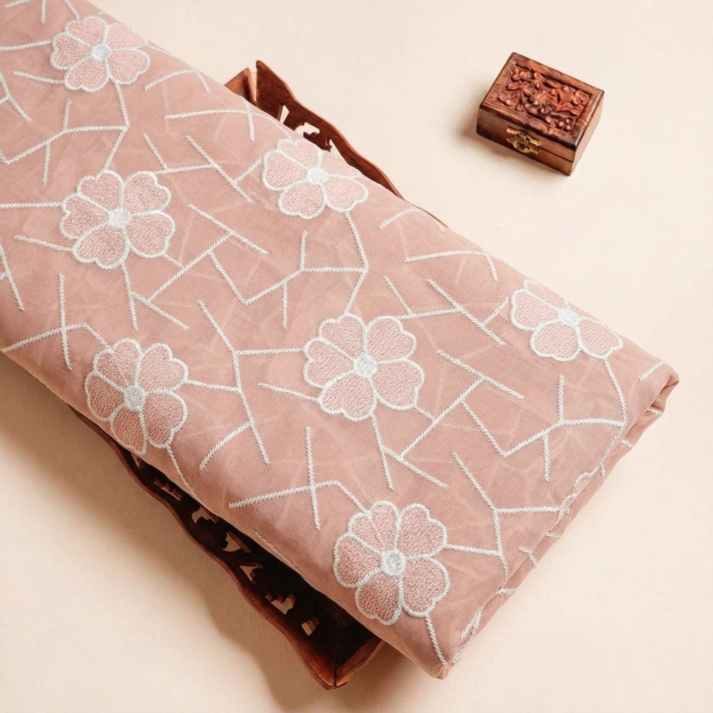 Folded Dusty Pink Embroidery Cotton Fabric Highlighting Floral Thread Work and Texture