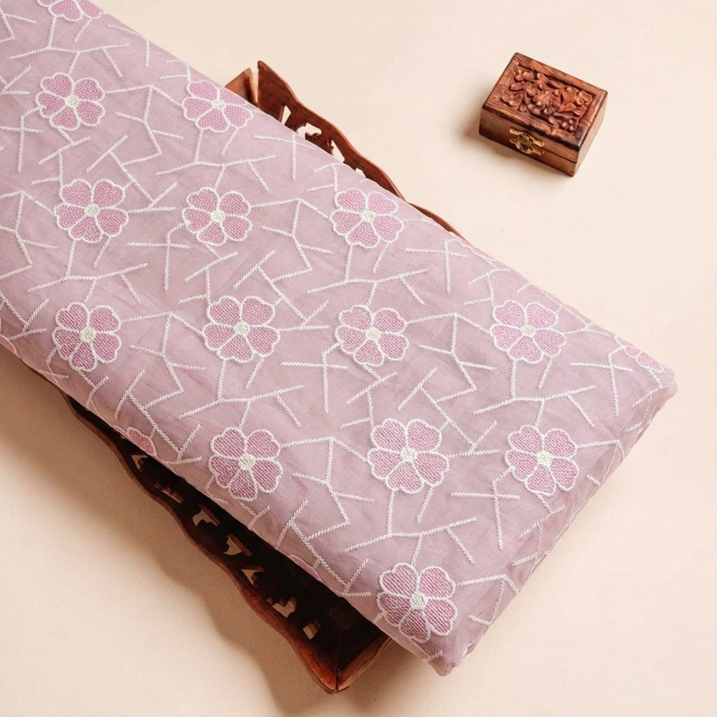 Folded Pink Embroidery Cotton Fabric Highlighting Thread Work Floral and Texture