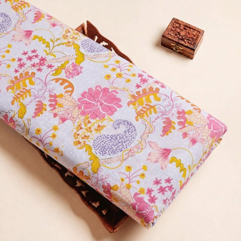 Folded Pink Paisley Cotton Fabric Highlighting Thread Work Floral and Texture
