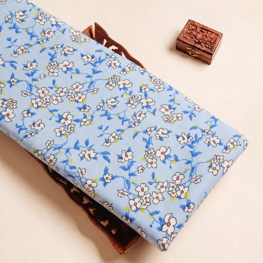 Folded Blue Floral Cotton Fabric Highlighting and Texture