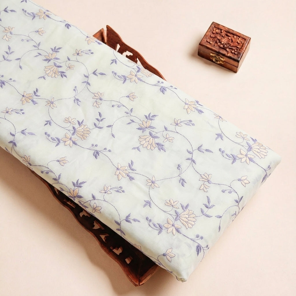 Folded Yellow Embroidery Cotton Fabric Highlighting Floral and Texture