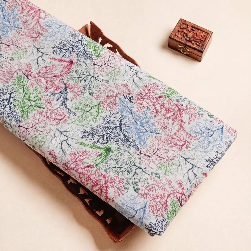 Folded Off White Hakoba Cotton Fabric Highlighting Floral and Texture
