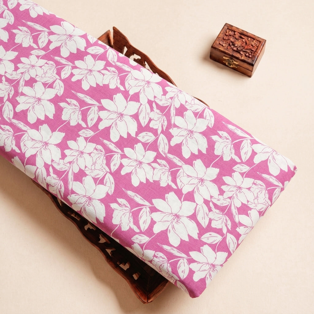 Folded Pink Floral Cotton Fabric Highlighting Polyester Mix and Texture