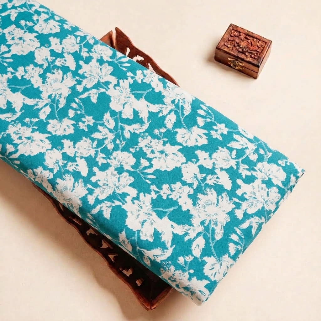 Folded Blue Floral Cotton Fabric Highlighting Polyester Mix and Texture