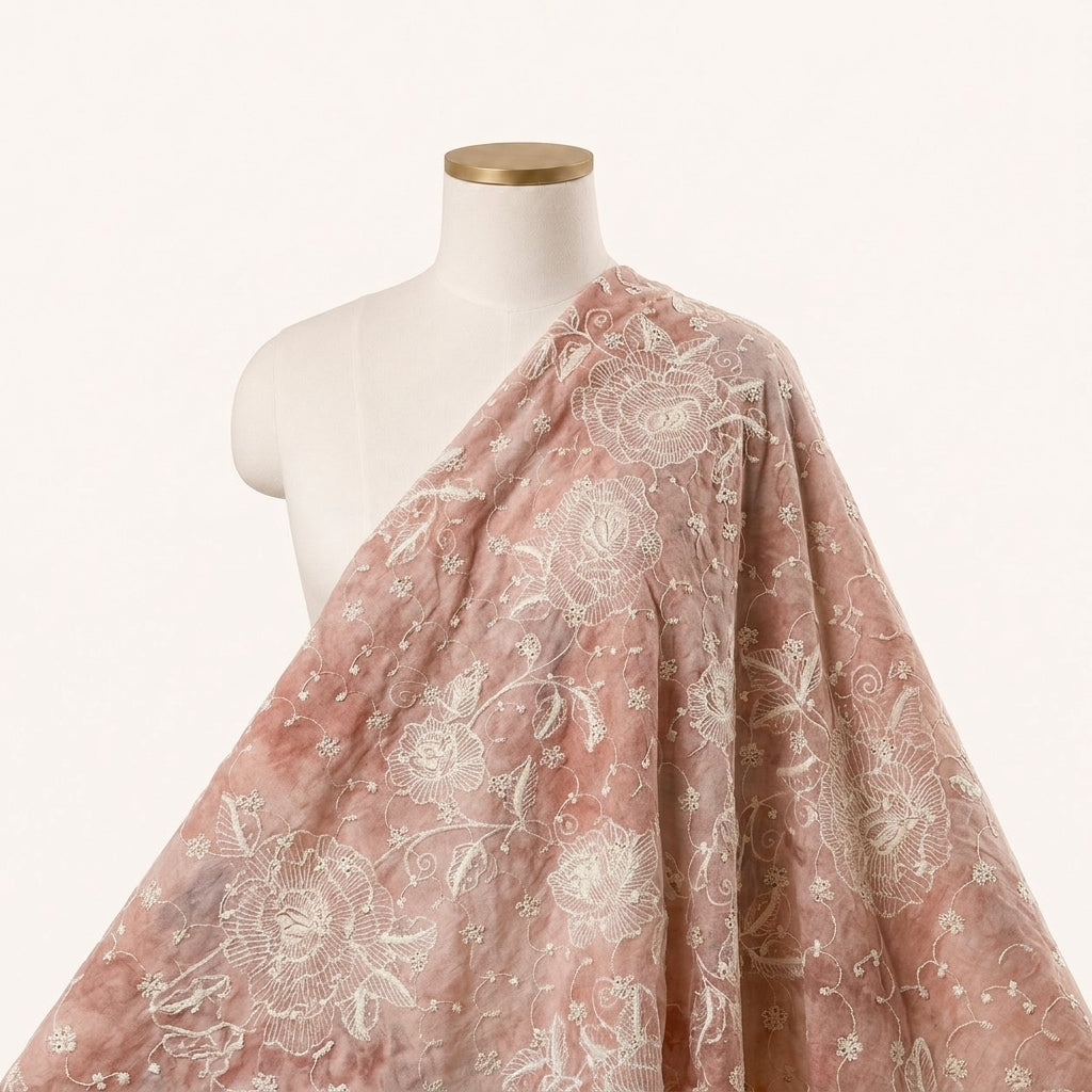 Peach Embroidery Cotton Fabric Draped as a saree
