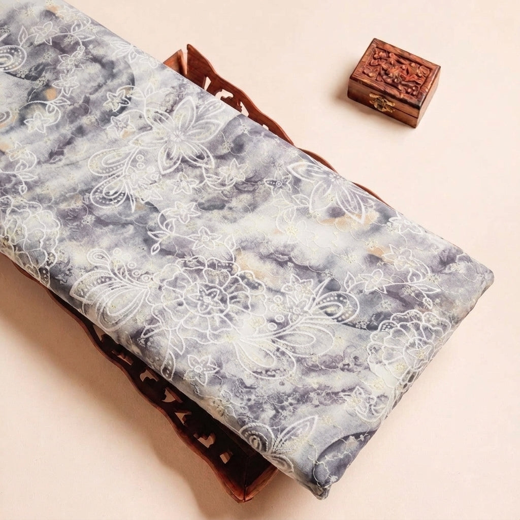 Folded Grey Embroidery Cotton Fabric Highlighting Floral and Texture