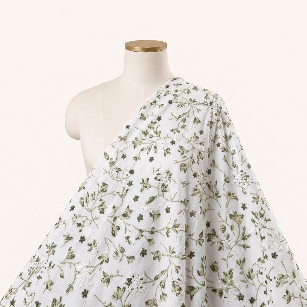 White Embroidery Cotton Fabric Draped as a saree