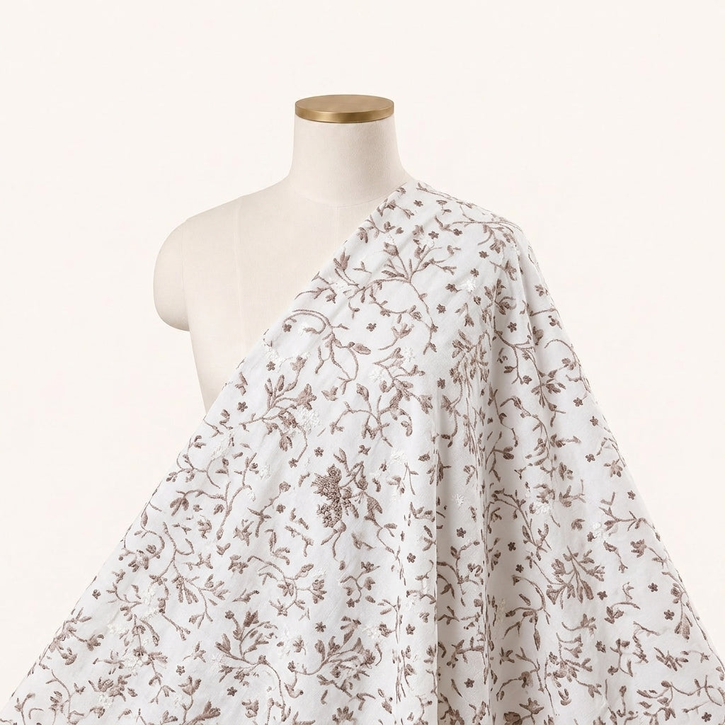 White Embroidery Cotton Fabric Draped as a saree