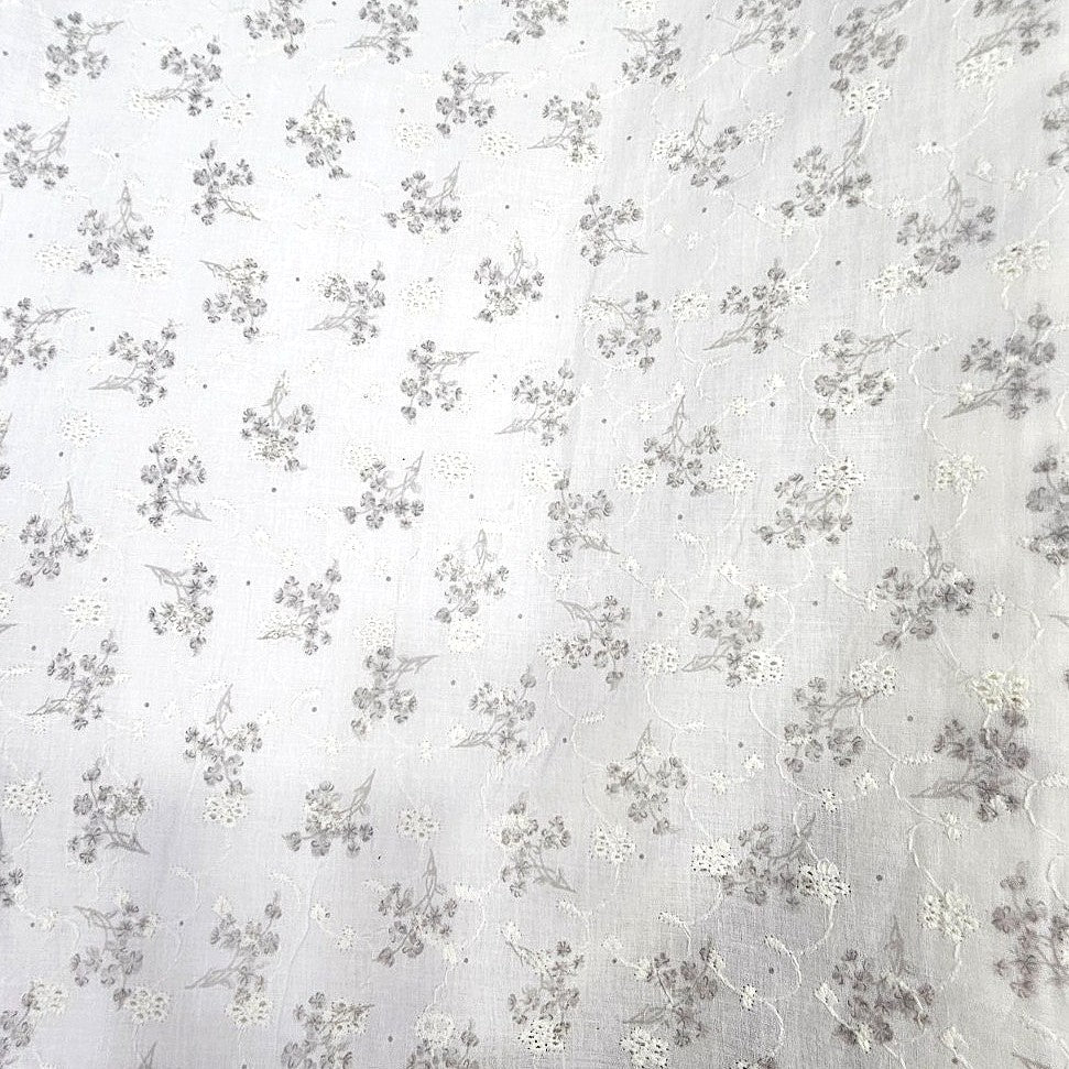 Grey Cream Embroidery Cotton Fabric, laid flat