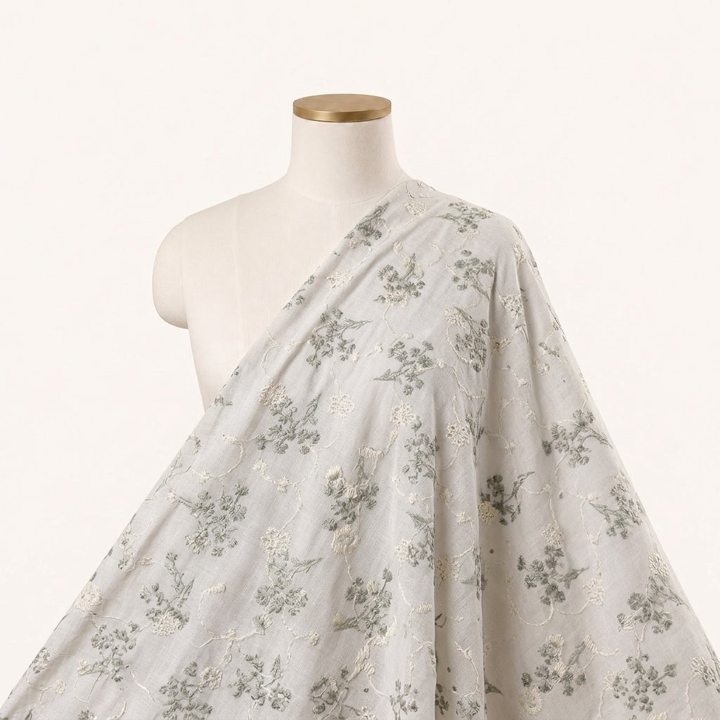 White Embroidery Cotton Fabric Draped as a saree