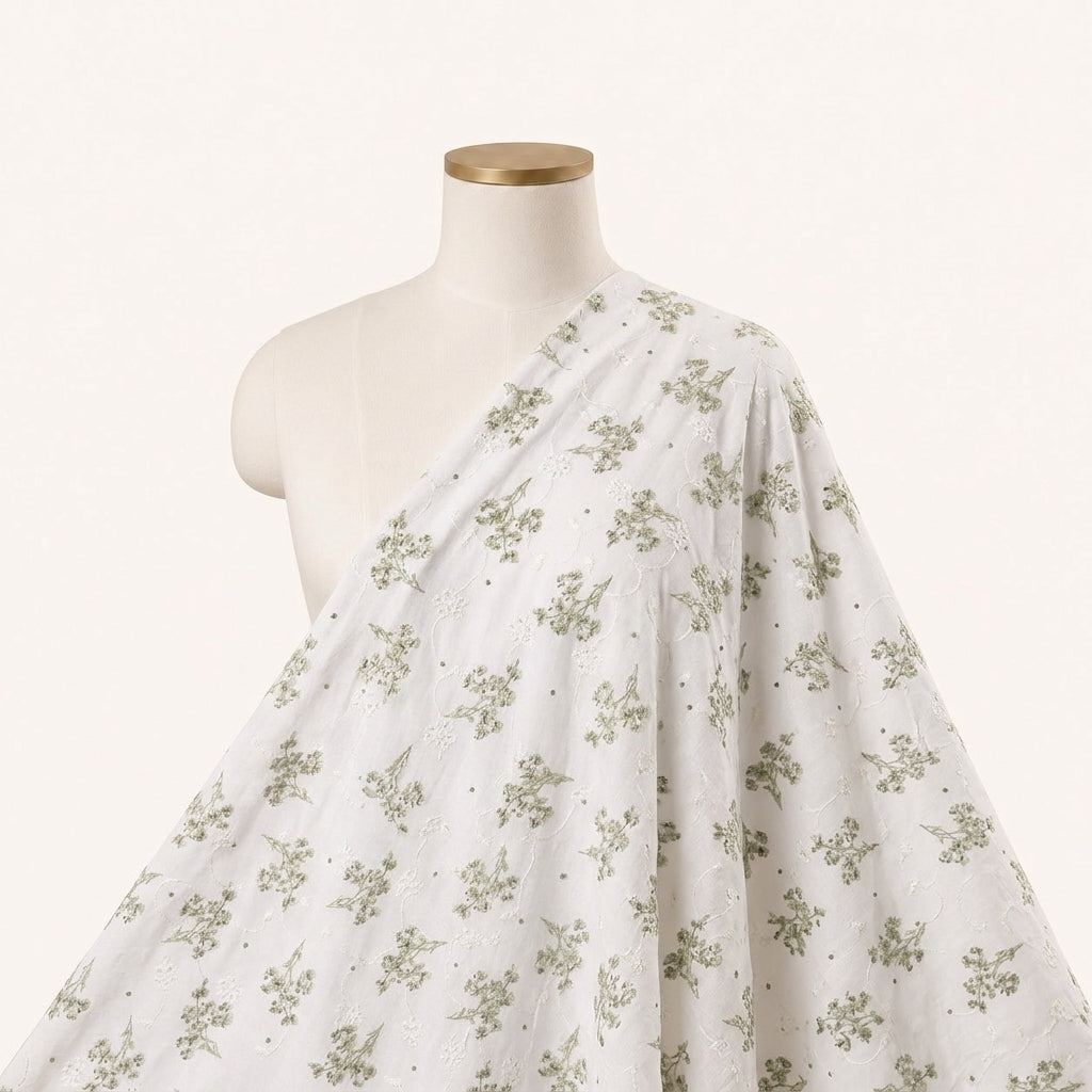 White Embroidery Cotton Fabric Draped as a saree