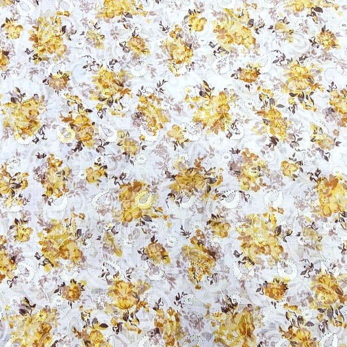 Yellow Cream Embroidery Cotton Fabric, laid flat