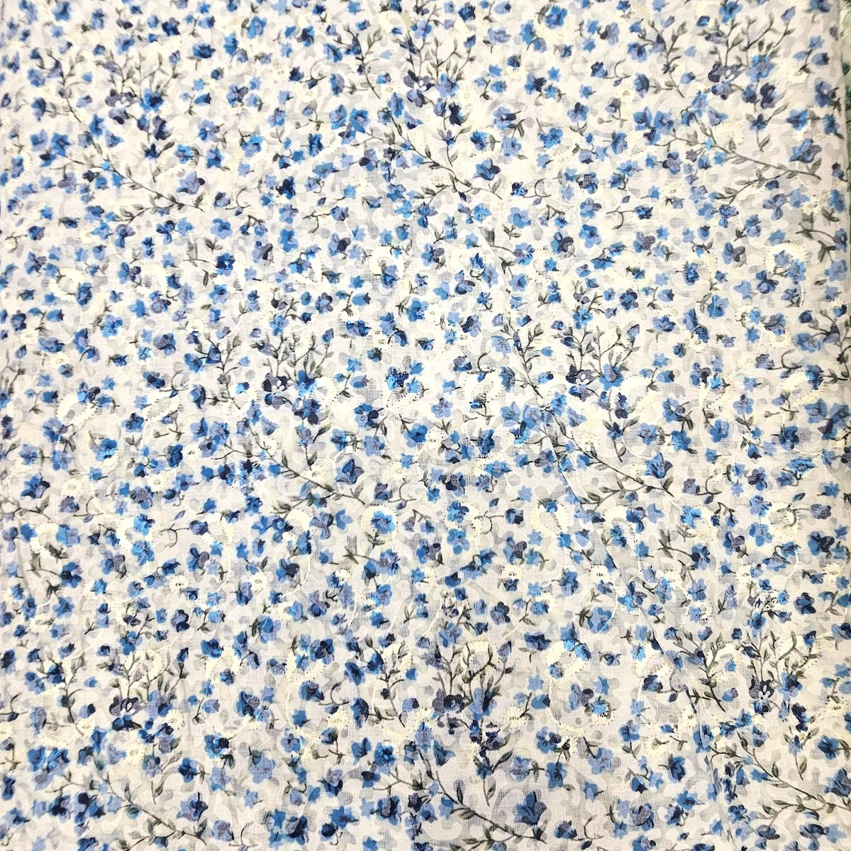 Blue Cream Embroidery Cotton Fabric, laid flat