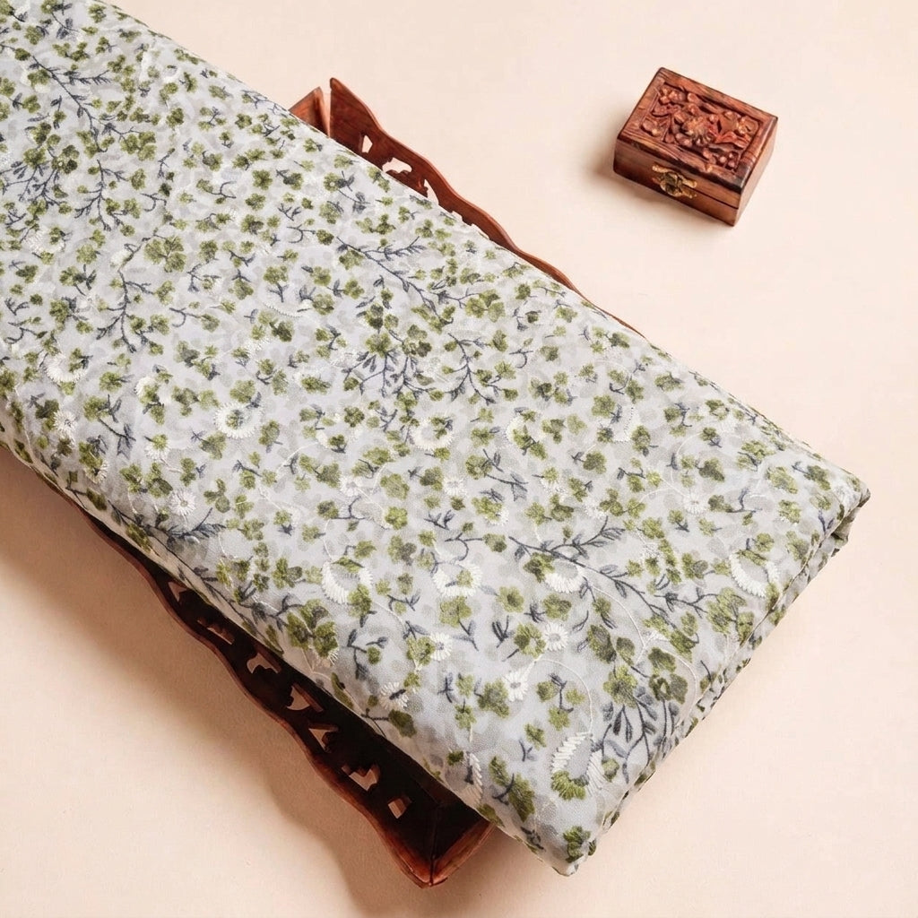 Folded Cream Embroidery Cotton Fabric Highlighting Floral and Texture