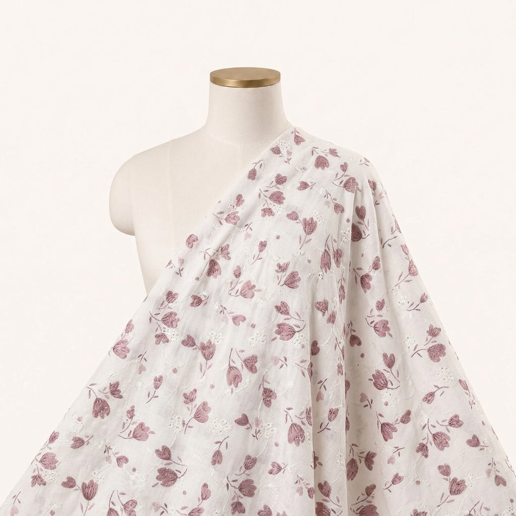 White Embroidery Cotton Fabric Draped as a saree