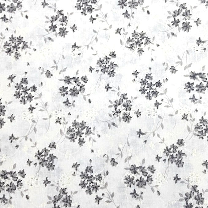 Black Cream Embroidery Cotton Fabric, laid flat