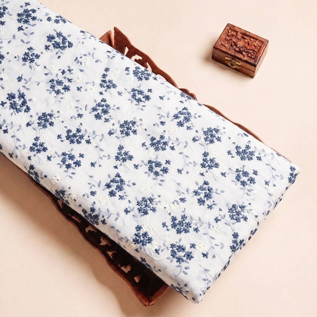 Folded Cream Embroidery Cotton Fabric Highlighting Floral and Texture