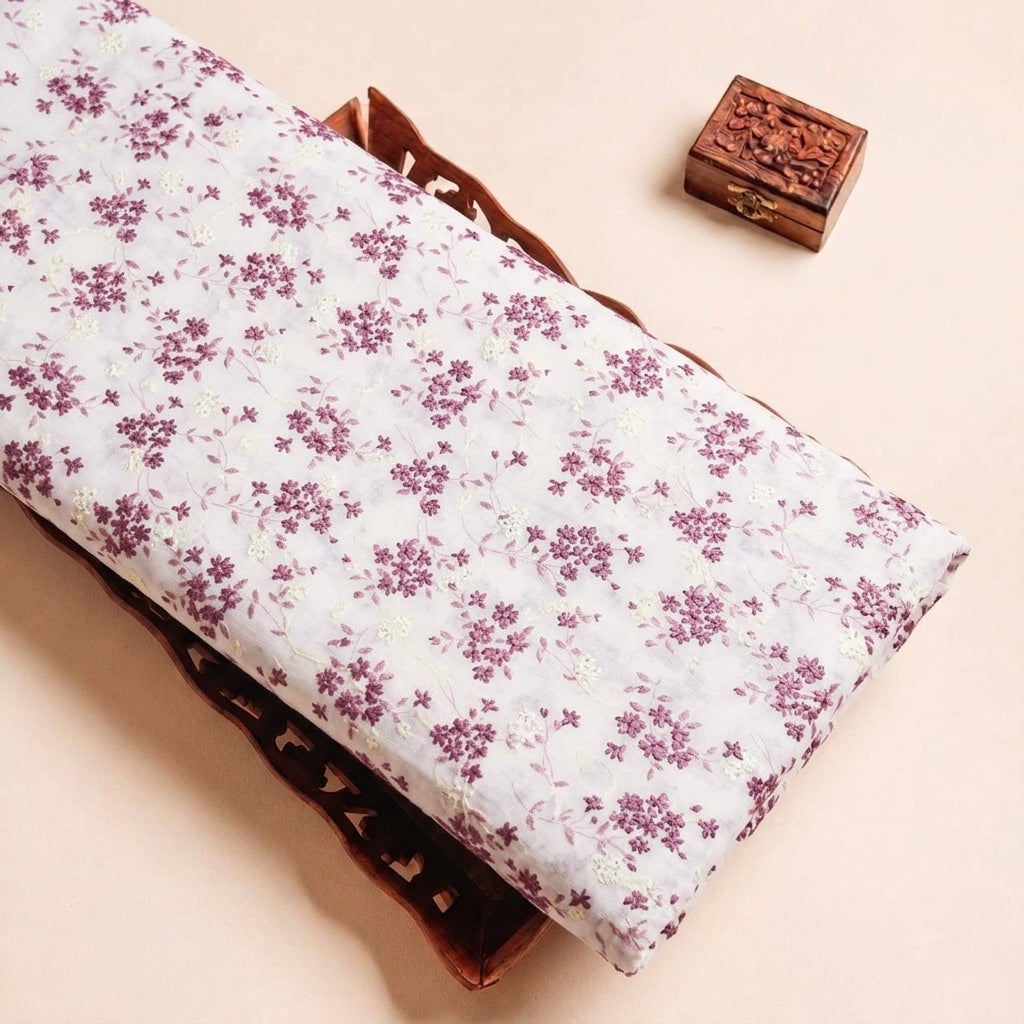 Folded Cream Embroidery Cotton Fabric Highlighting Floral and Texture