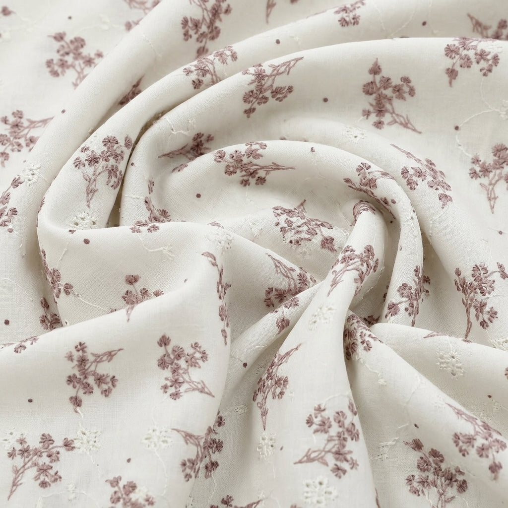 Swirled Cream Embroidery Cotton Fabric Showing Floral and Drape