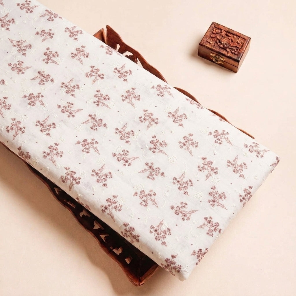 Folded Cream Embroidery Cotton Fabric Highlighting Floral and Texture