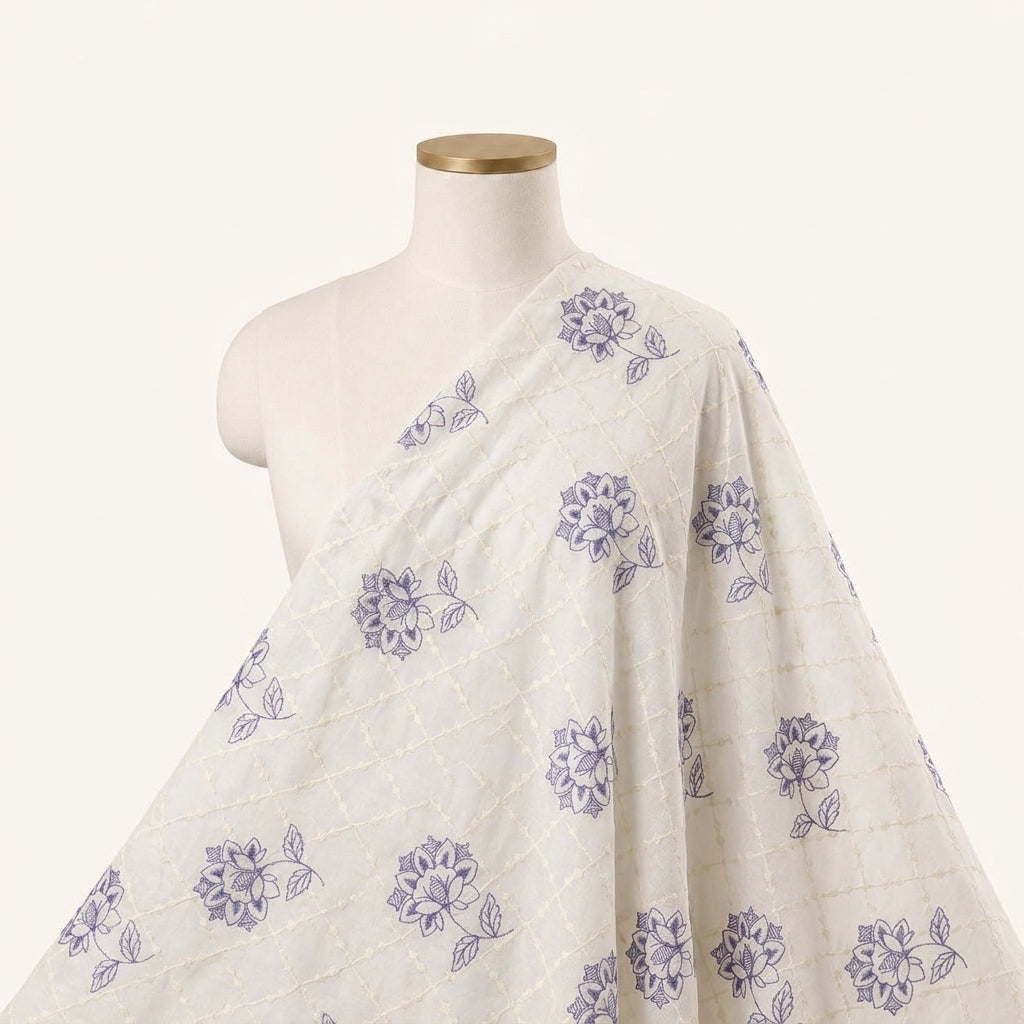 Embroidery Cream Embroidery Cotton Fabric Draped as a saree