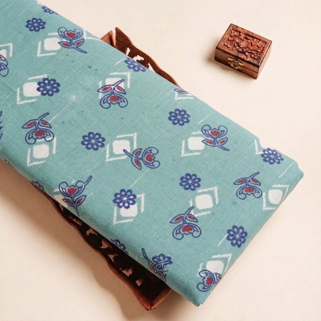 Folded Green Floral Cotton Fabric Highlighting and Texture