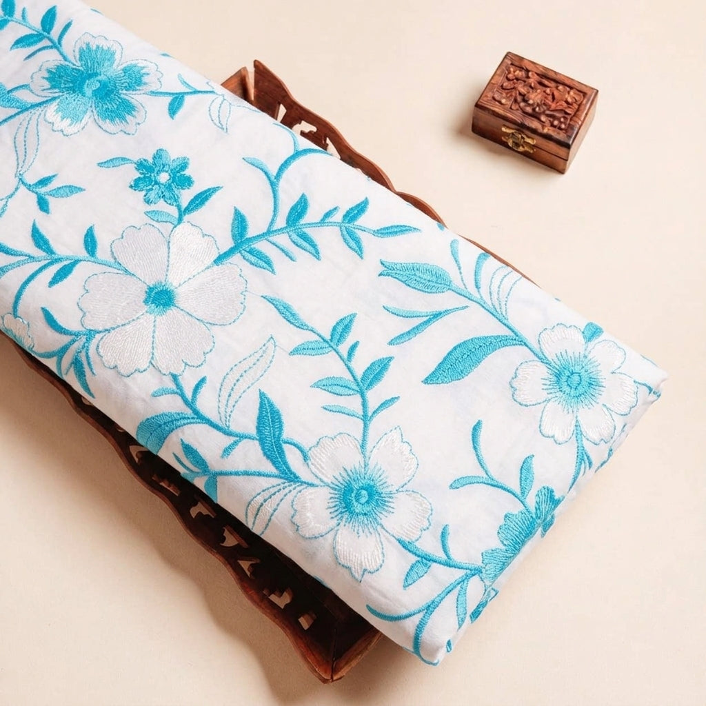 Folded White Embroidery Cotton Fabric Highlighting and Texture