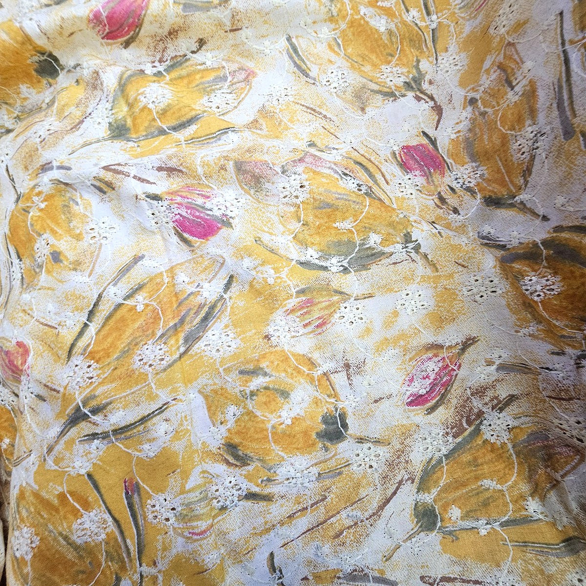 Yellow Embroidery Cotton Fabric, laid flat