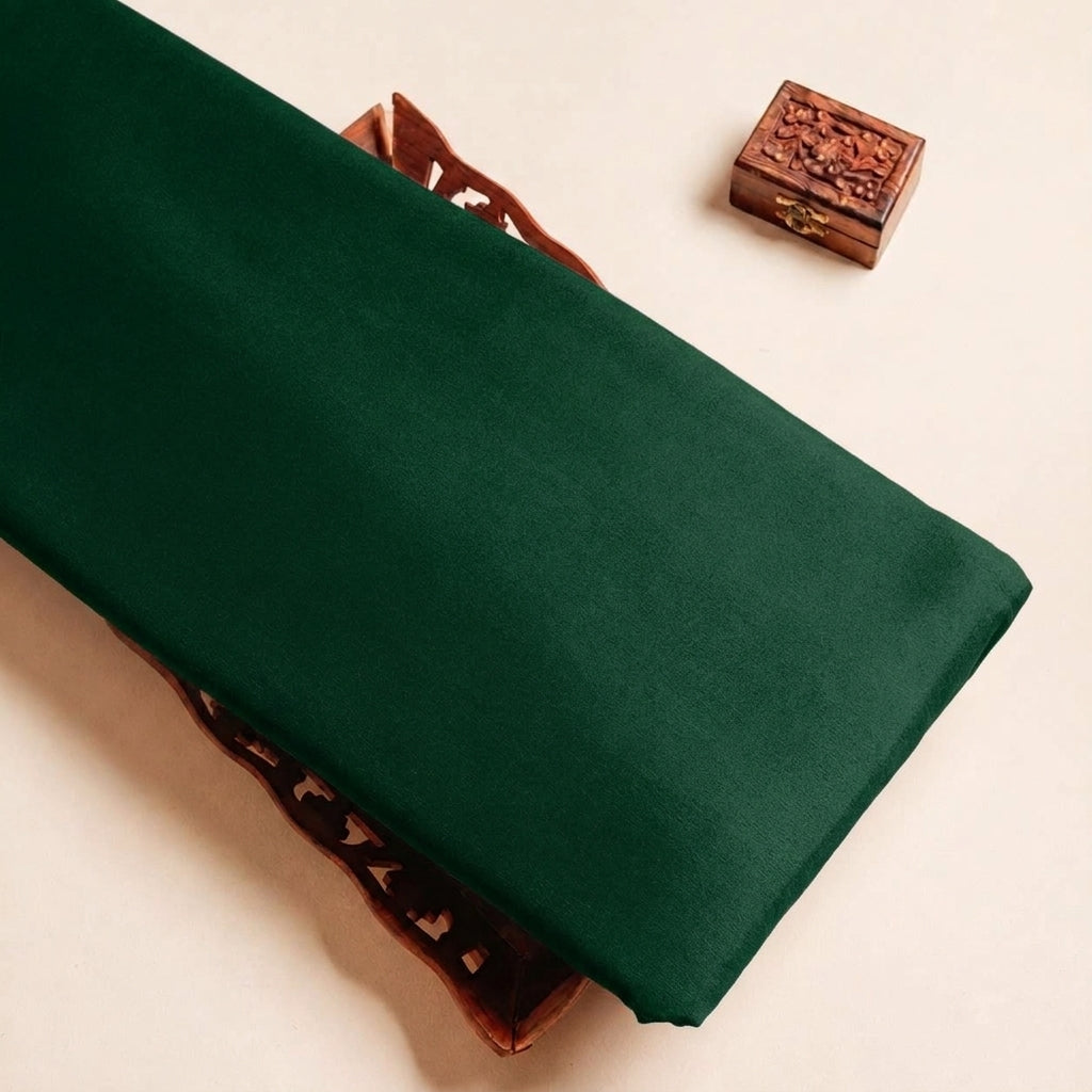 Folded Emerald Green Plain Satin Fabric Highlighting Lining and Texture