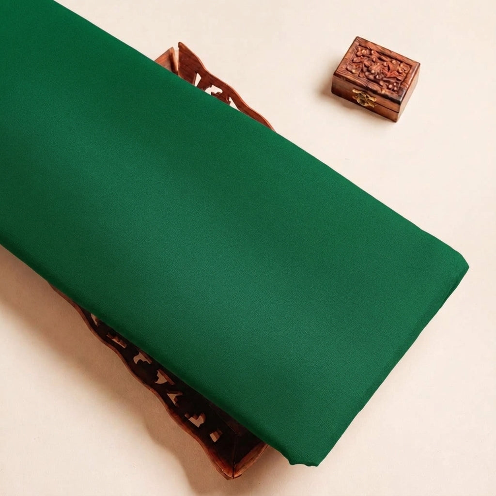 Folded Green Plain Satin Fabric Highlighting Lining and Texture