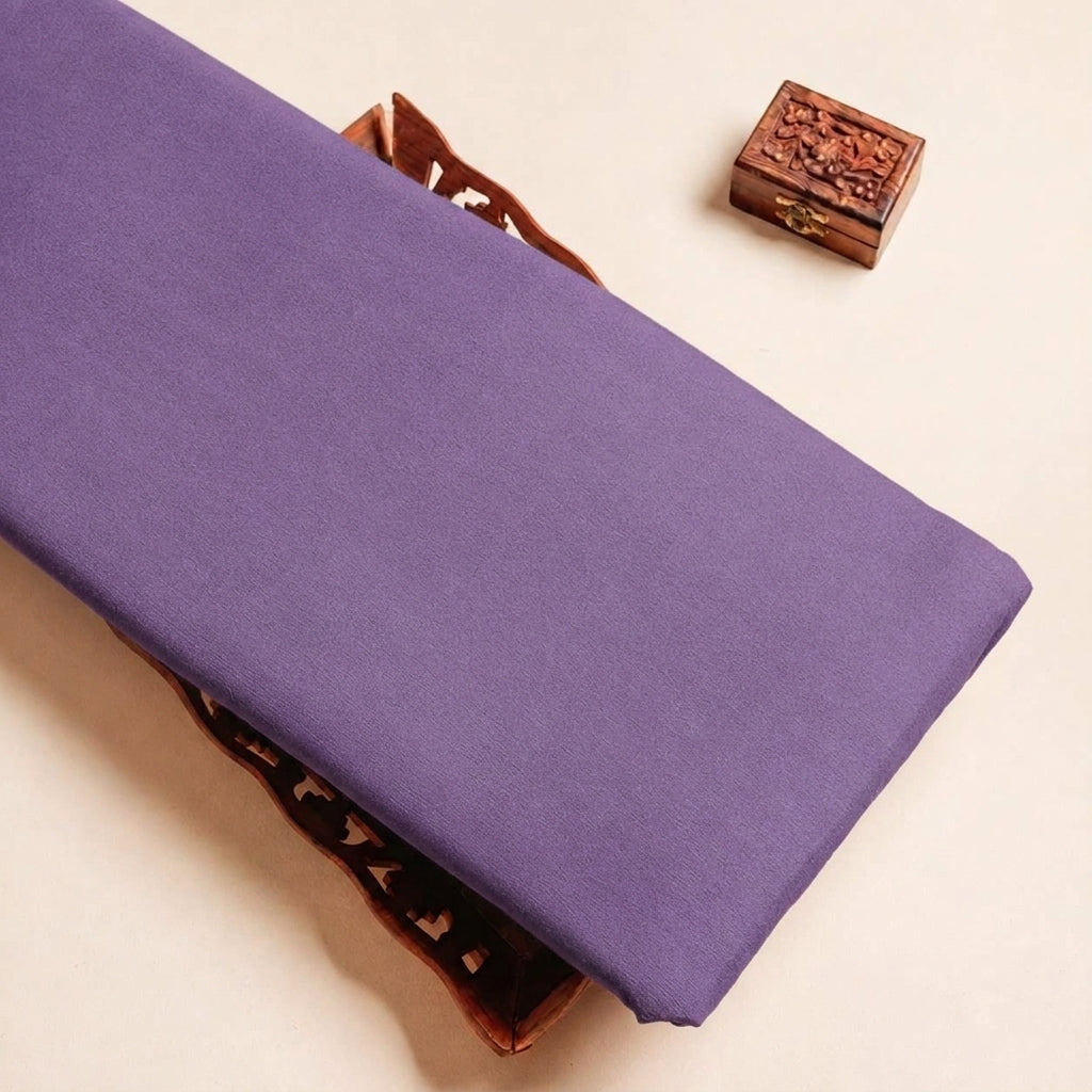 Folded Lavender Plain Crepe Fabric Highlighting Lining and Texture