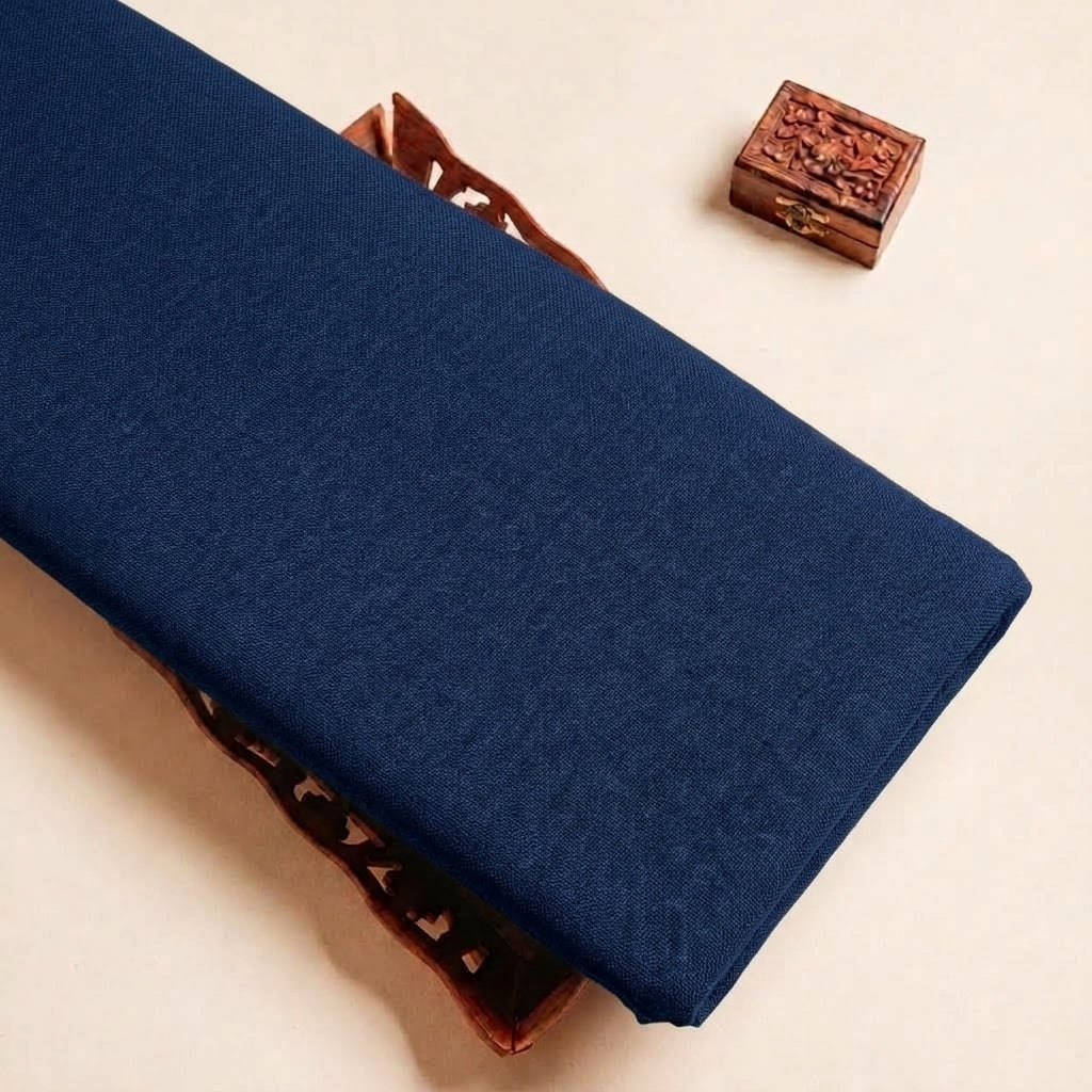 Folded Navy Blue Plain Cambric Cotton Fabric Highlighting and Texture