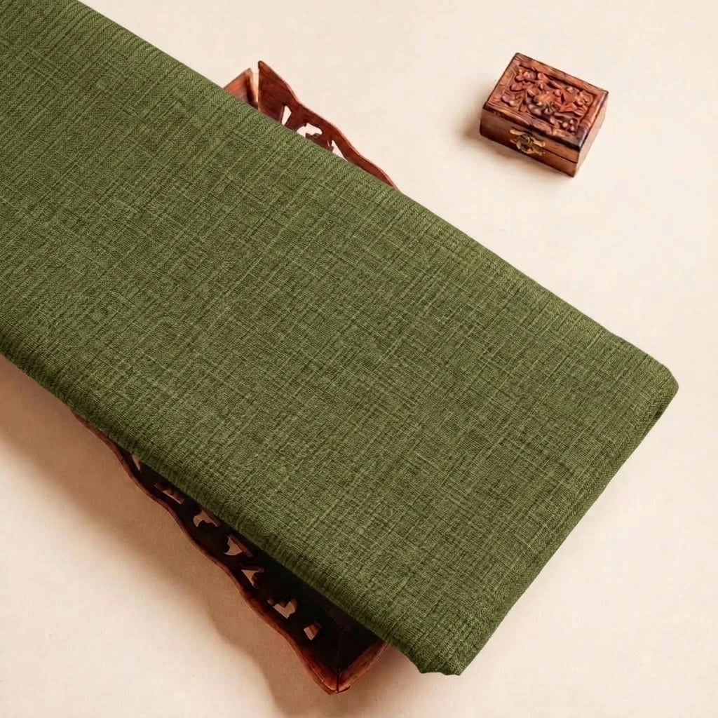 Folded Olive Green Plain Cambric Cotton Fabric Highlighting and Texture