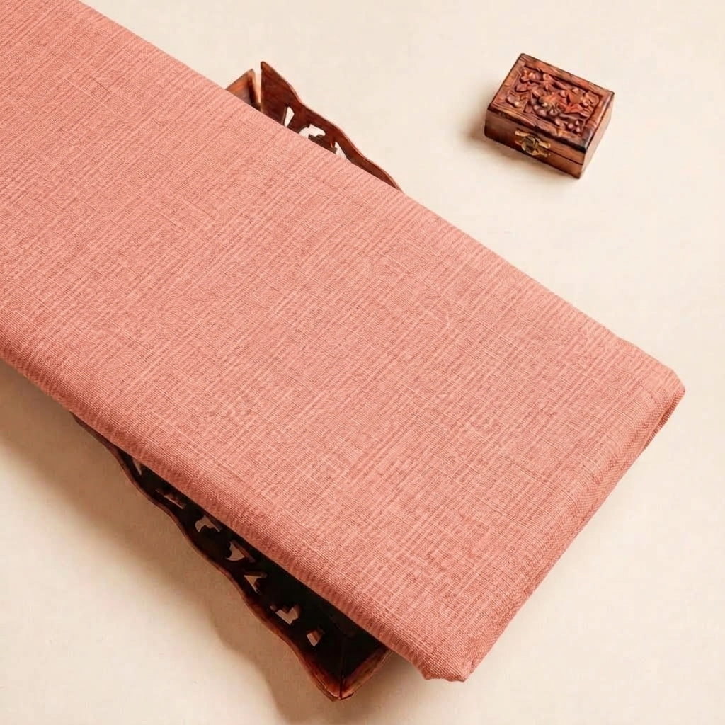 Folded Peach Plain Cambric Cotton Fabric Highlighting and Texture