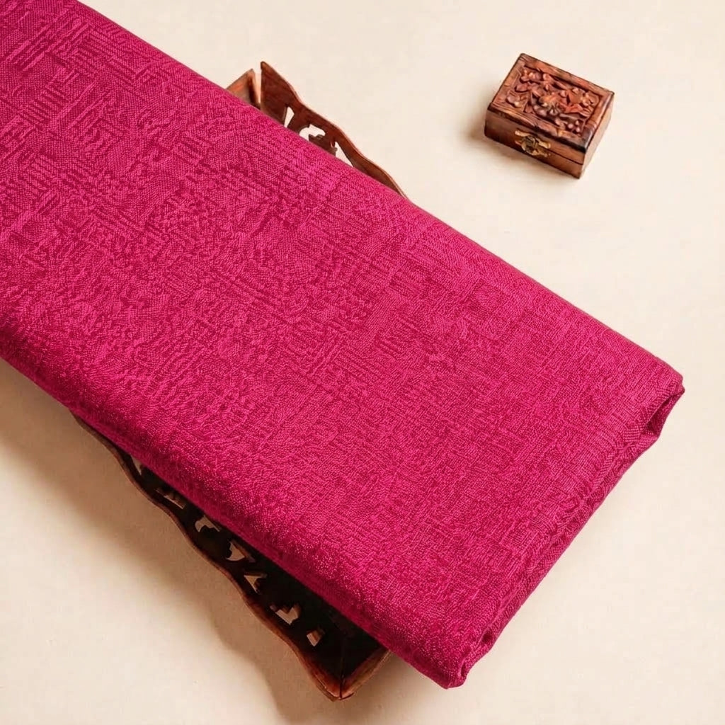 Folded Rani Pink Plain Cambric Cotton Fabric Highlighting and Texture