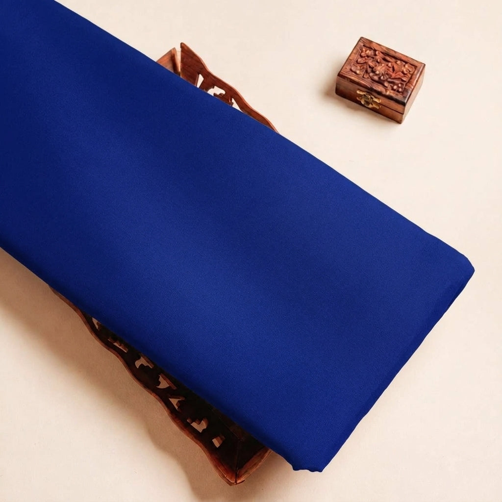 Folded Royal Blue Plain Satin Fabric Highlighting Lining and Texture